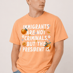 Immigrants Are Not Illegal But The President Is Tee - Hands Off United