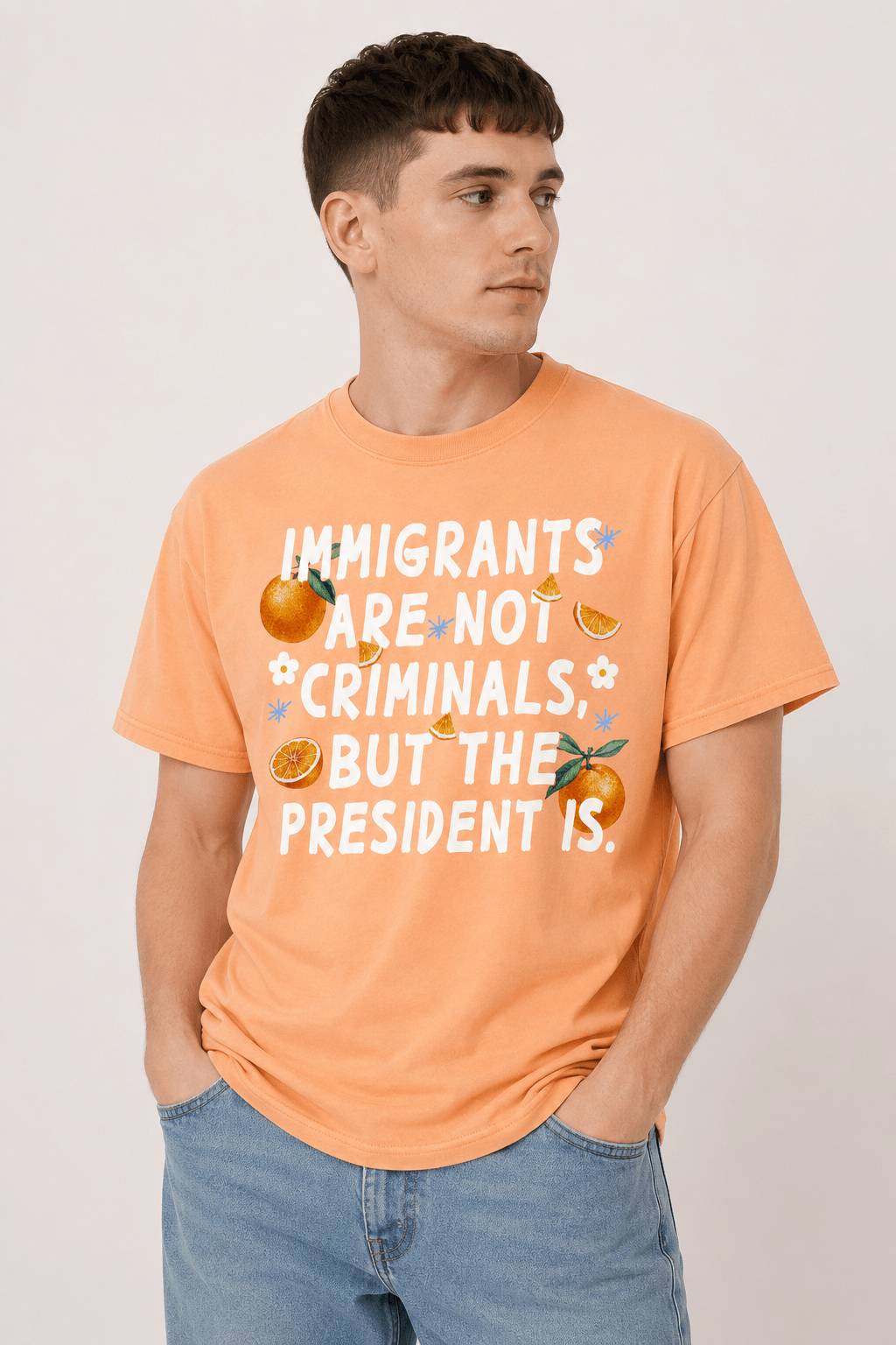 Immigrants Are Not Illegal But The President Is Tee - Hands Off United
